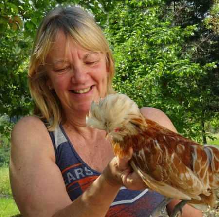 Me with one of my young Polish chickens, Sandro. Cath Andrews, with Sandro, a Polish chicken rooster.
