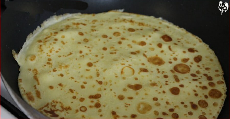 The batter cooks quickly - then toss it! Cooking the batter in a pan.