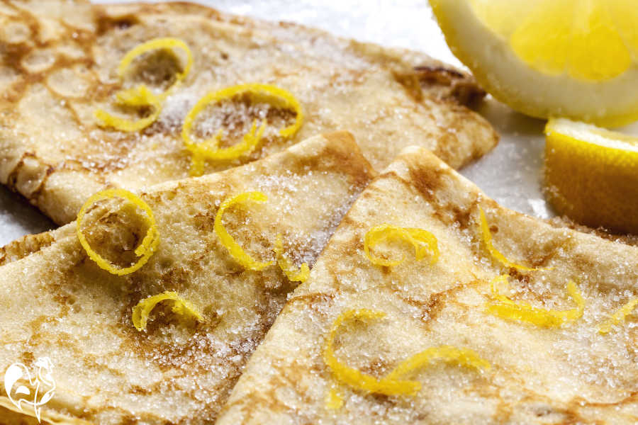 English pancakes, traditionally served with sugar and lemon juice. English pancakes served with sugar and lemon juice.
